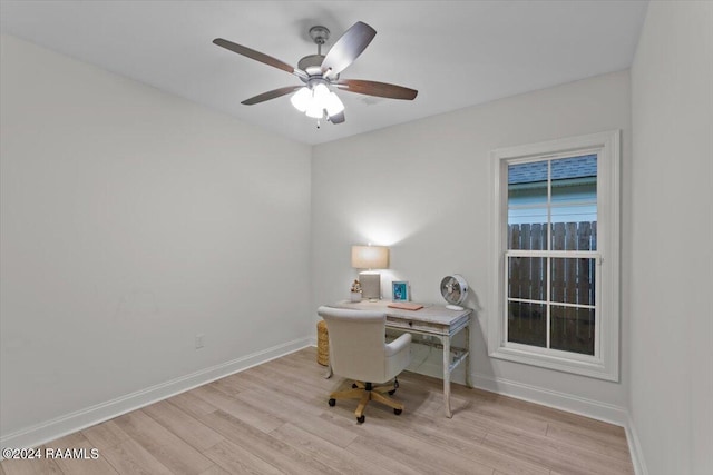 office area featuring light hardwood / wood-style flooring and ceiling fan