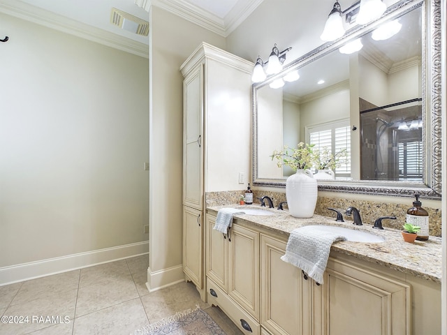 bathroom with ornamental molding, a shower with door, tile patterned flooring, and vanity