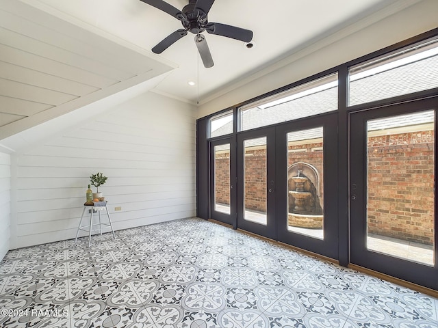 interior space with crown molding and vaulted ceiling