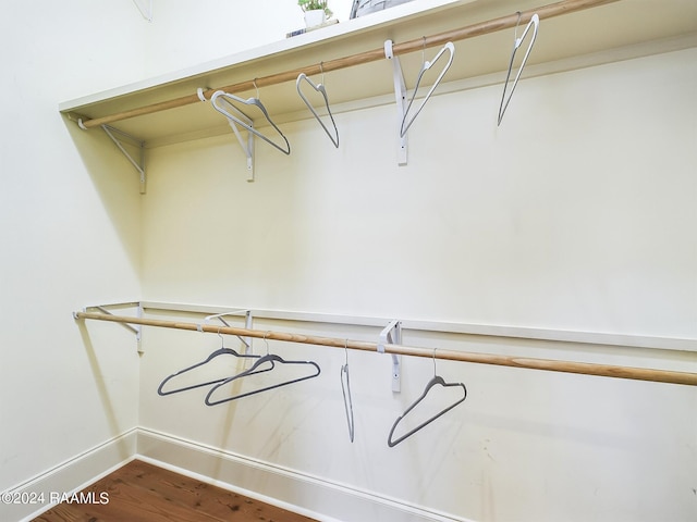 walk in closet featuring hardwood / wood-style floors