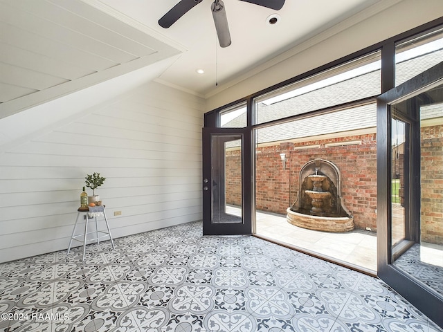 entryway featuring ornamental molding