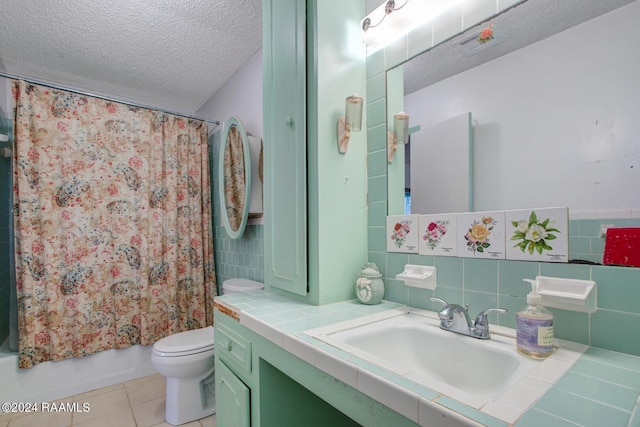 full bathroom with shower / bath combo, a textured ceiling, tasteful backsplash, and tile walls