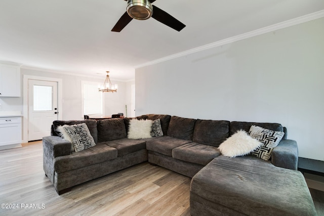 living room featuring crown molding, light hardwood / wood-style flooring, and ceiling fan with notable chandelier