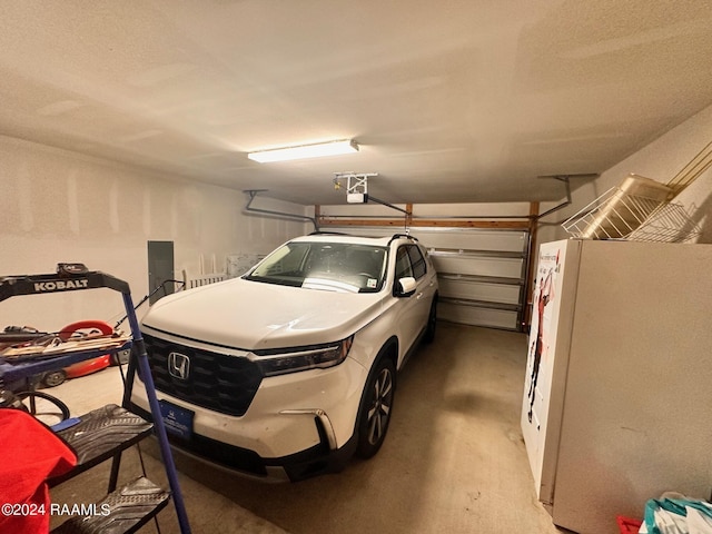 garage with white fridge