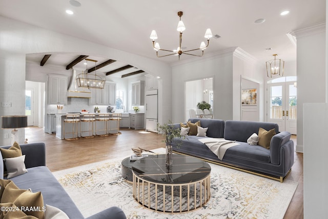 303 Ivy Cottage Dr, Youngsville, LA 70592 - living area featuring a chandelier, healthy amount of natural light, light wood-type flooring, beam ceiling, and recessed lighting