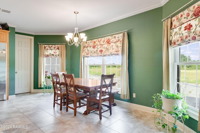 dining area with an inviting chandelier and crown molding