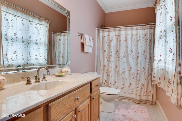 bathroom with tile patterned flooring, vanity, ornamental molding, and toilet