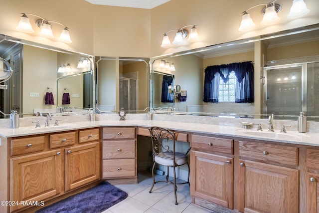 bathroom with tile patterned floors, ornamental molding, a shower with door, and vanity