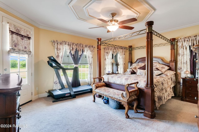 carpeted bedroom featuring ceiling fan, ornamental molding, and access to exterior