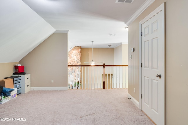 additional living space featuring lofted ceiling and carpet flooring