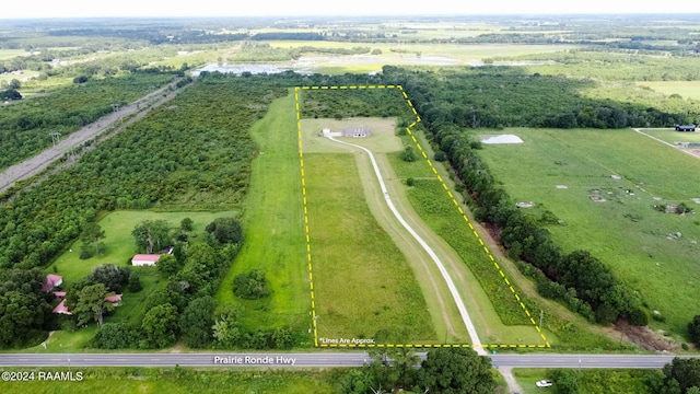 birds eye view of property featuring a rural view