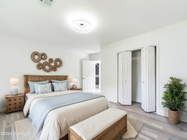 bedroom featuring light wood-type flooring