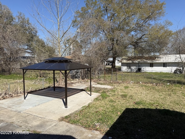 view of yard featuring a gazebo and fence