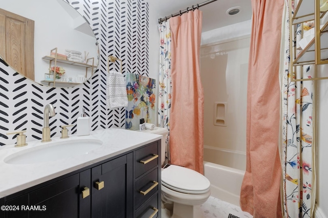 full bathroom with decorative backsplash, shower / tub combo, vanity, and toilet