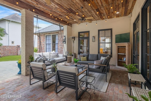 view of patio featuring outdoor lounge area and ceiling fan