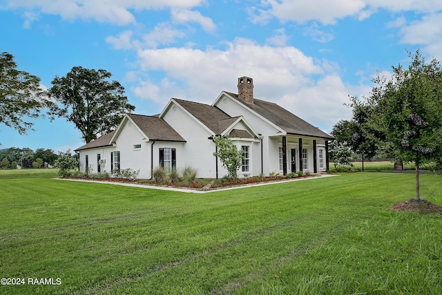 view of front of property with a front lawn