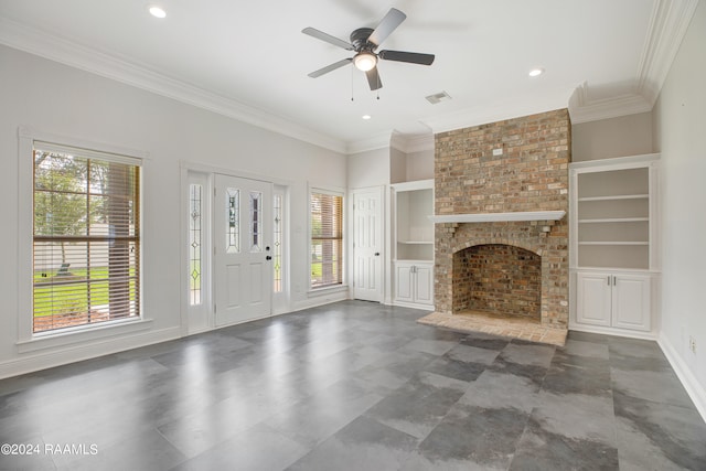 unfurnished living room featuring built in shelves and plenty of natural light