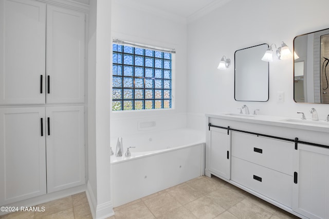 bathroom with tile patterned floors, vanity, crown molding, and a bath