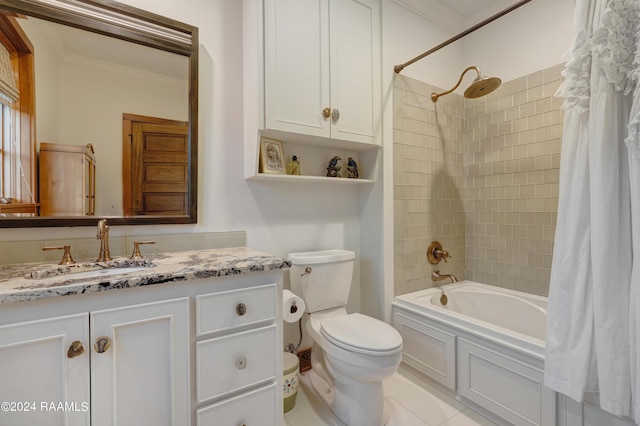 bathroom with toilet, vanity, crown molding, and shower / tub combo with curtain