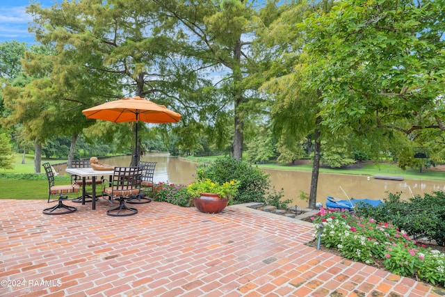 view of patio / terrace featuring a water view
