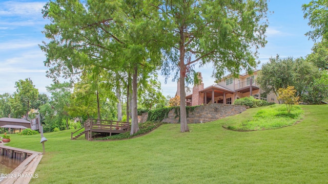 view of yard with stairway and a wooden deck