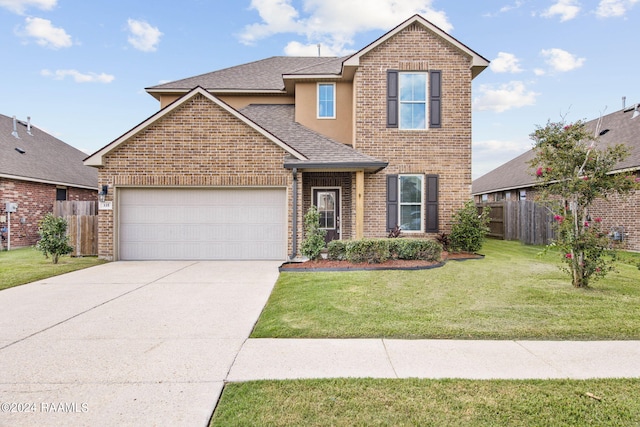 front of property with a front lawn and a garage