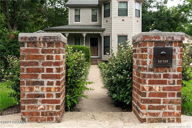 319 Goodwin St, Welsh, LA 70591 - victorian-style house with a shingled roof