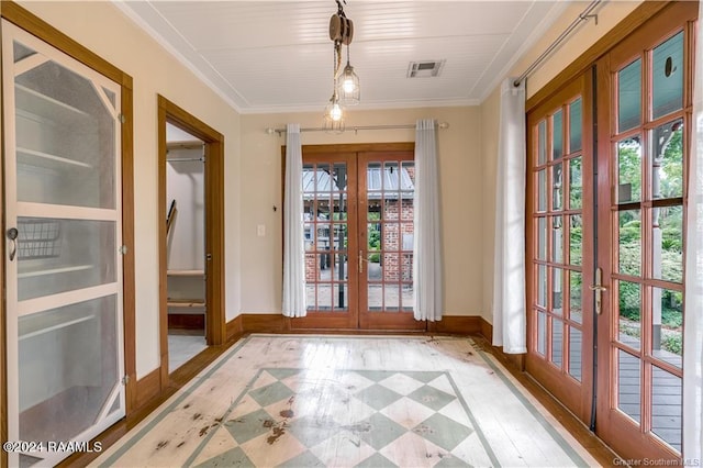 319 Goodwin St, Welsh, LA 70591 - doorway to outside featuring french doors and crown molding