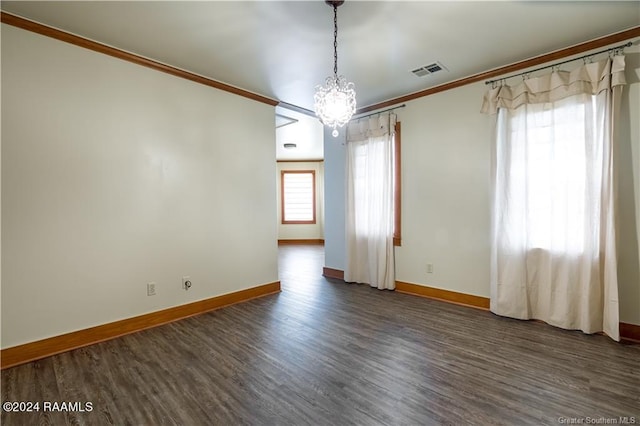 319 Goodwin St, Welsh, LA 70591 - unfurnished room featuring a chandelier, ornamental molding, and dark wood finished floors
