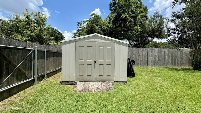 view of outdoor structure with a lawn