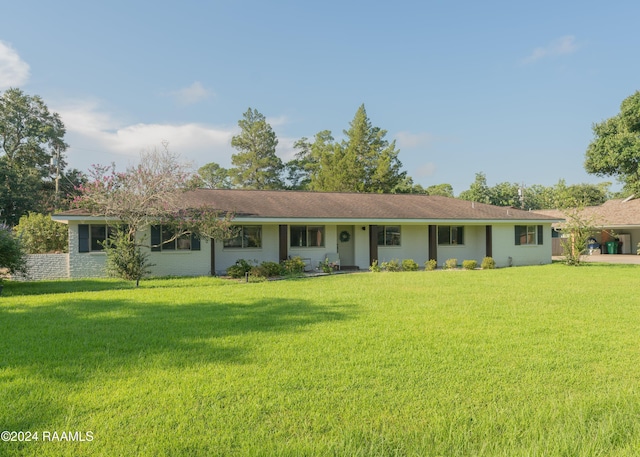 single story home featuring a front yard