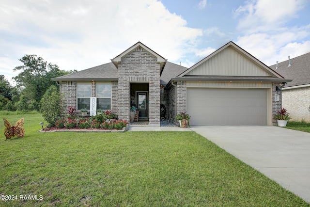 view of front facade featuring a garage and a front lawn