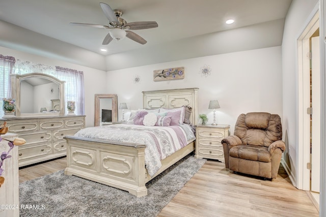 bedroom featuring ceiling fan and light wood-type flooring