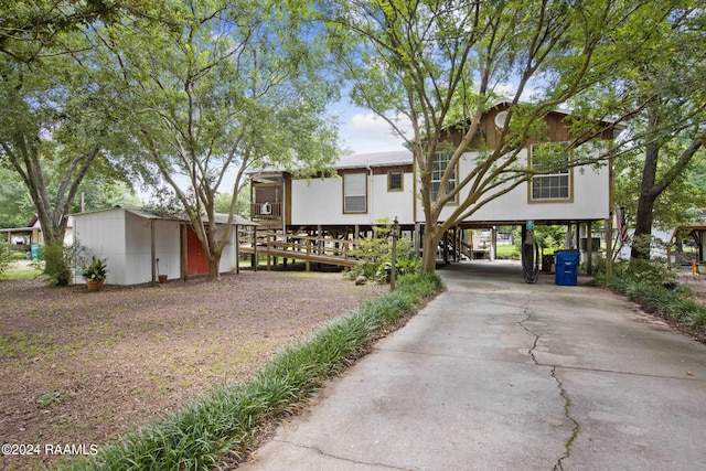 view of front of house featuring a carport