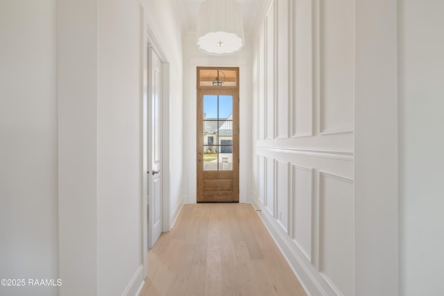 entryway with light wood-style flooring