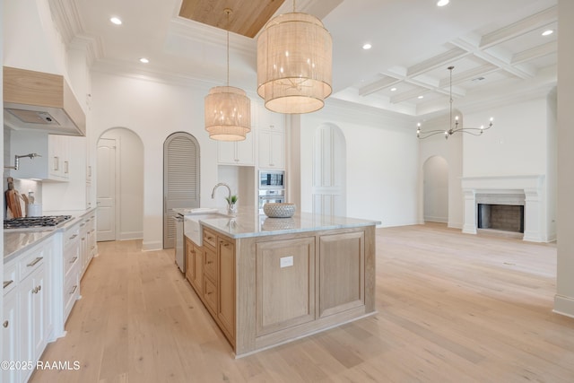 100 Winthorpe Row, Lafayette, LA 70503 - kitchen with arched walkways, premium range hood, built in microwave, and a sink
