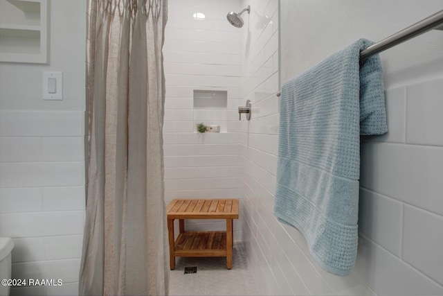 bathroom featuring curtained shower