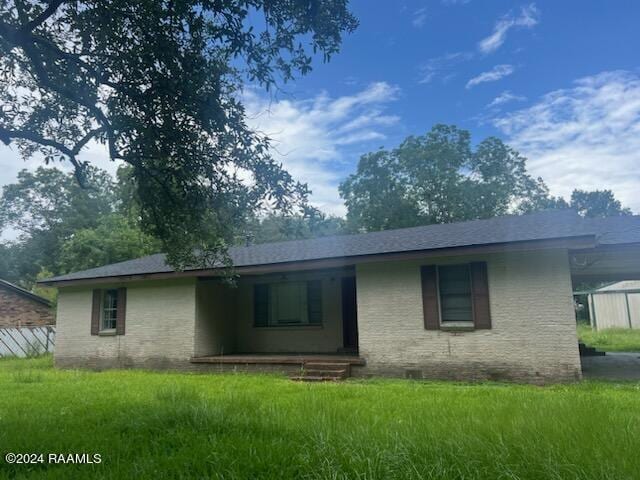 213 Robitaille Rd, New Iberia, LA 70560 - back of house with a porch