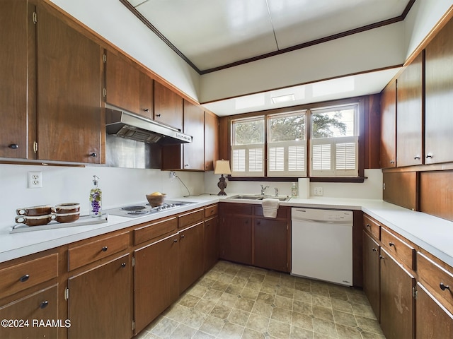 kitchen with sink, white appliances, and light tile patterned floors