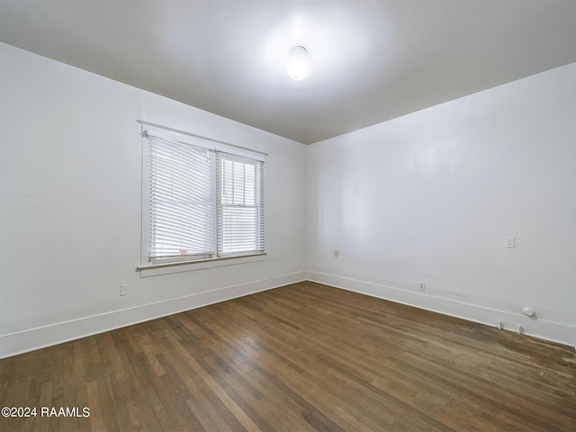903 Myrtle Pl, Lafayette, LA 70506 - empty room featuring dark wood-style floors and baseboards