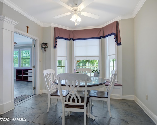 201 Marquette St, New Iberia, LA 70563 - dining space with ornamental molding, baseboards, and ceiling fan