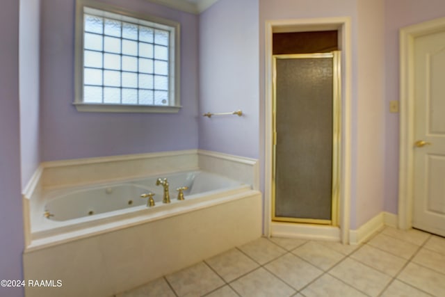 bathroom featuring plus walk in shower, tile patterned floors, and crown molding