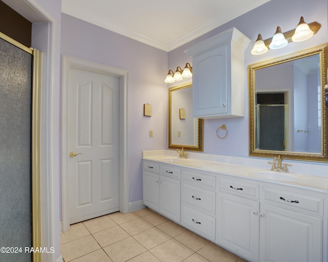 bathroom featuring tile patterned floors, a shower with shower door, and crown molding