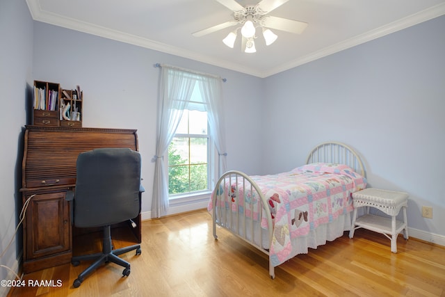 bedroom with ceiling fan, crown molding, and light wood-type flooring