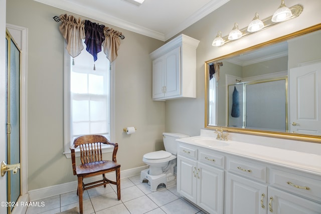 bathroom featuring tile patterned flooring, vanity, crown molding, and a shower with shower door