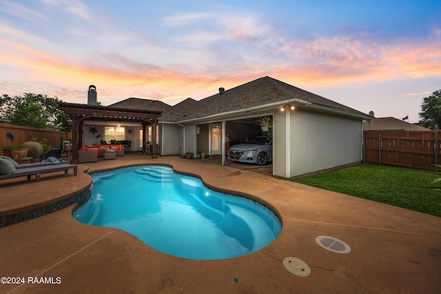 pool at dusk with a patio, outdoor lounge area, and a pergola