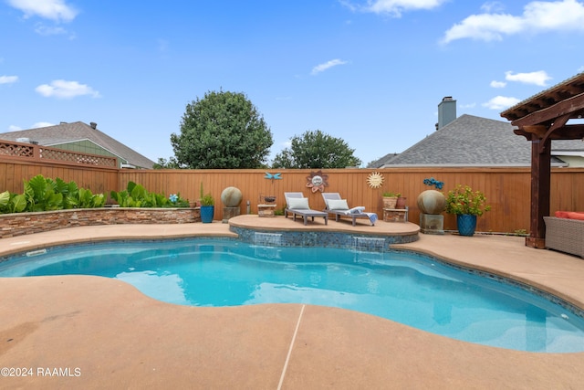 view of swimming pool featuring a patio