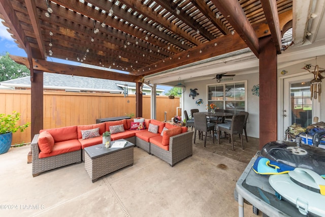 view of patio featuring an outdoor hangout area and a pergola