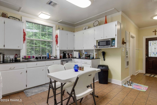 kitchen featuring white cabinetry and appliances with stainless steel finishes