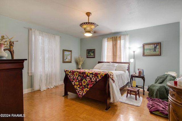 bedroom featuring light parquet floors